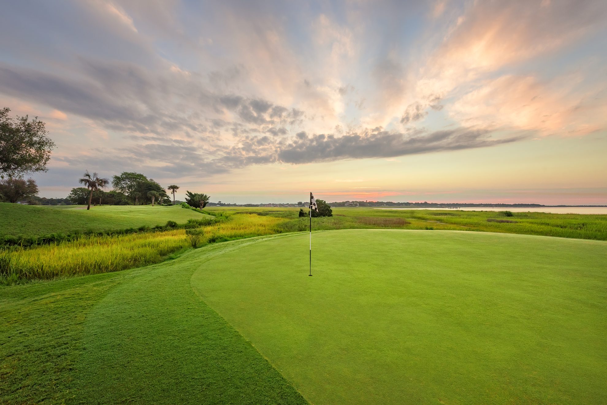 golf course with spectacular sky