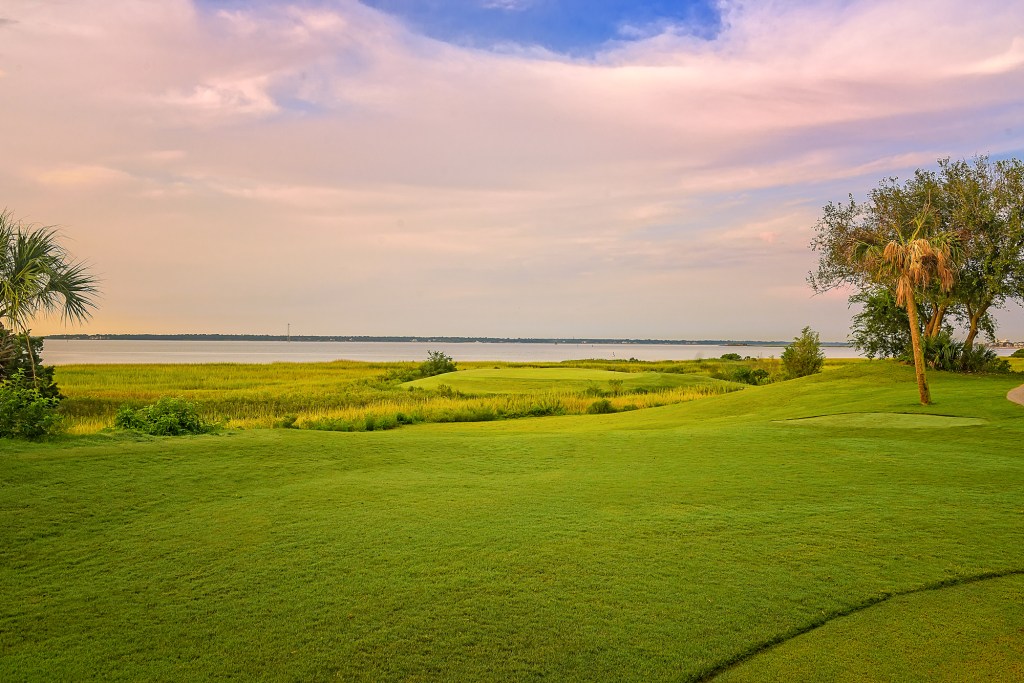 golf course with pink sky